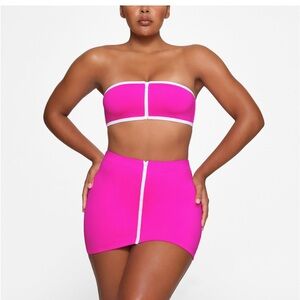 SKIMS Neon Pink Bandeau Bikini Set with White Trim